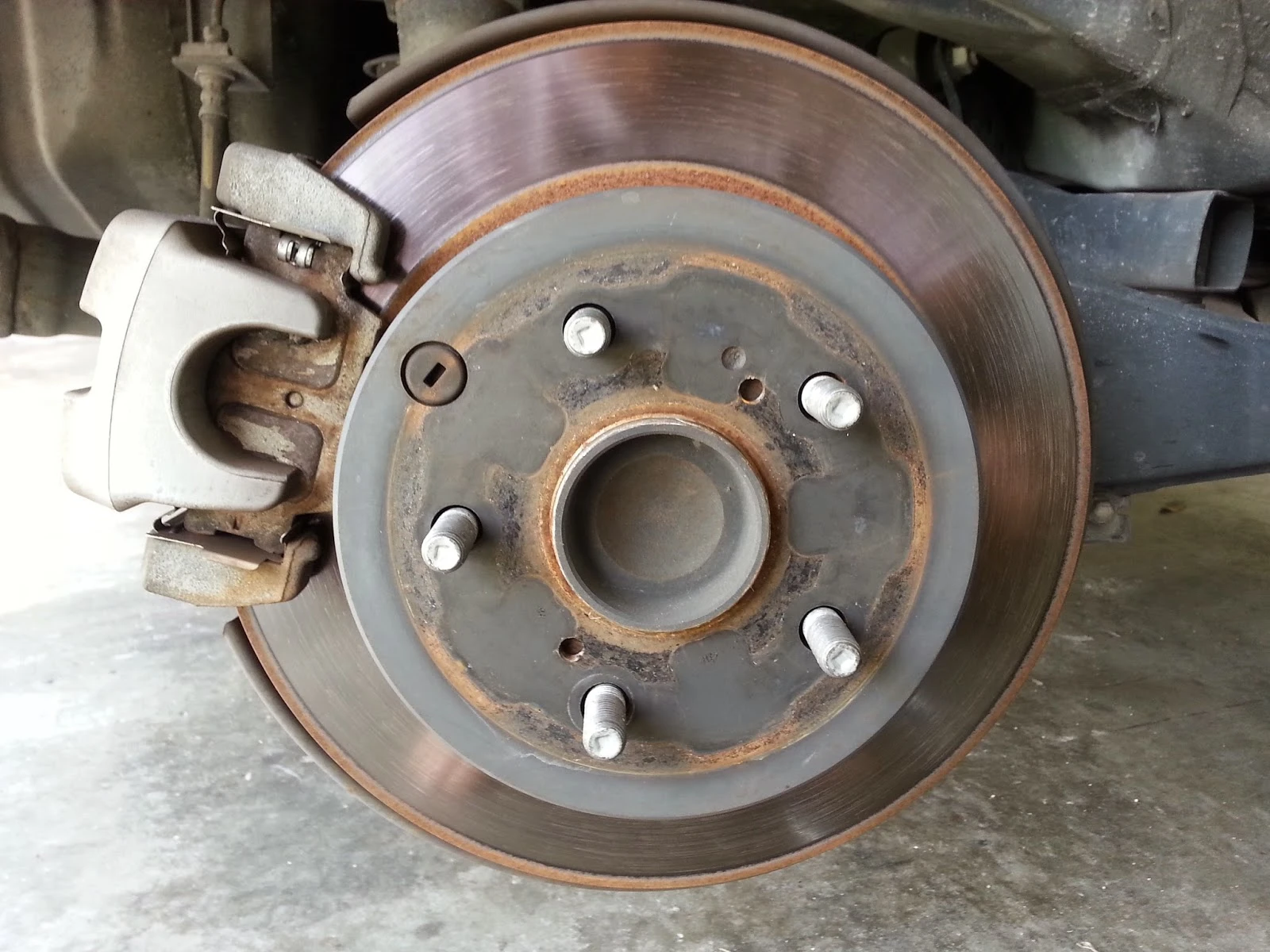 worn brake rotors before service
